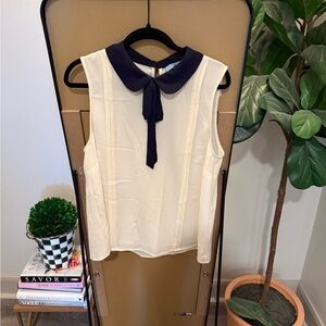 CeCe Cream Sleeveless Blouse with Navy Tie Collar